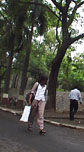 Lady walking by SOM building.