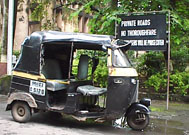 Rickshaw parked inside IITB's Main Gate