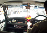 Inside a taxi.