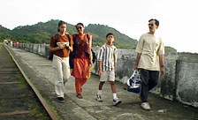 Krithi's family walking back on Elephanta pier.