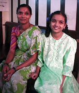 Mother and daughter at optician, Powai.